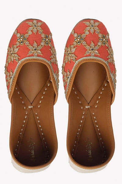 Orange embroidered juttis
