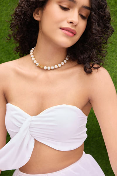 Gold and white beaded necklace