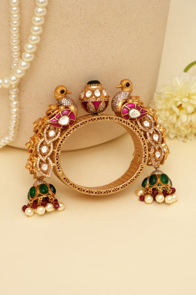Multicoloured gold plated peacock kada bangle