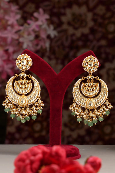 Ivory and green kundan chandbali earrings