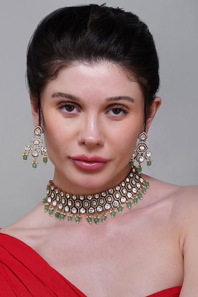 White kundan and green beaded choker set