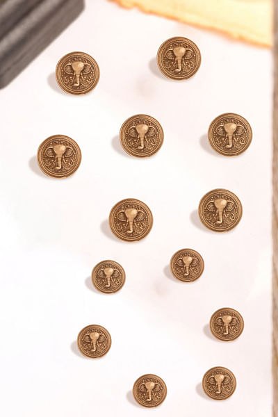 Antique gold royal elephant brass button set