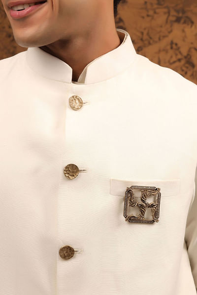 Antique gold Swastik brooch