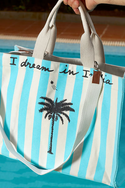 Azure blue and black palm tree printed tote bag