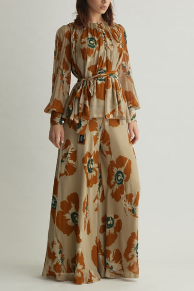 Beige and rust floral flared pants