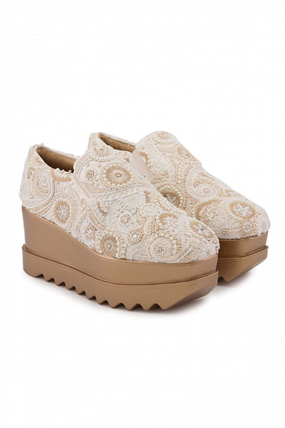 Beige pearl embellished wedge sneakers