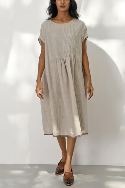 Beige pintuck flared dress