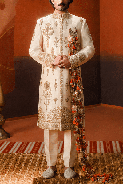Beige zardozi tassel embroidered sherwani set