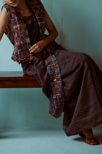 Black embroidered jacket and checkered sari