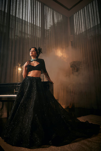 Black floral embroidered cape and lehenga set