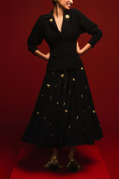 Black mascot embellished jacket and skirt