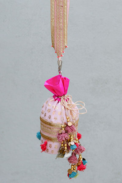 Blush pink floral woven tasselled bucket bag