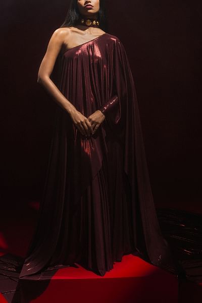 Burgundy one-shoulder cape and drape skirt set
