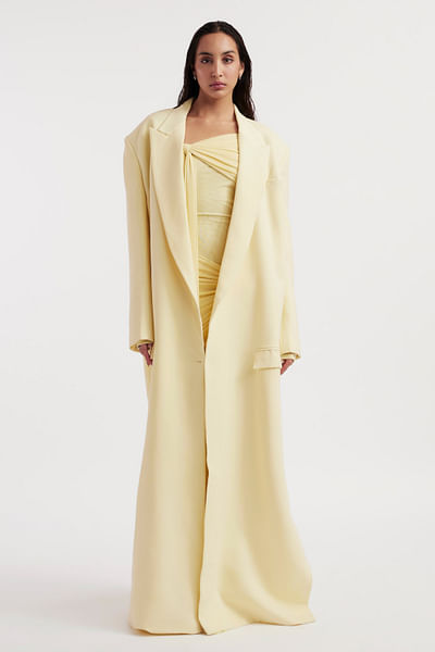 Butter yellow oversized trench coat and gown