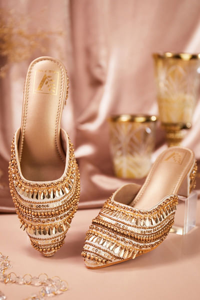 Cream embellished mule heels