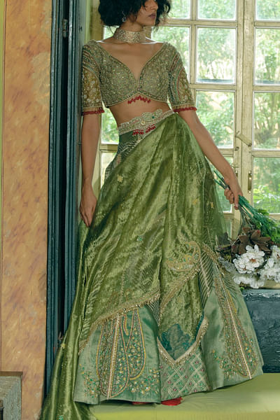 Emerald green embroidered tissue lehenga set