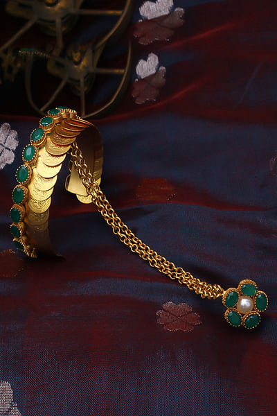 Gold coin embellished haathphool