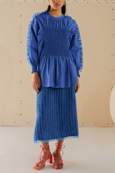 French blue smocked and frilled top