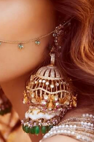 Gold and green bead embellished jhumkas