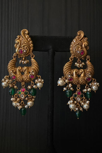 Gold and green peacock precious stone earrings
