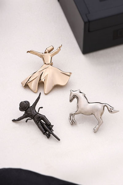 Gold and grey animal and human brooch gift set
