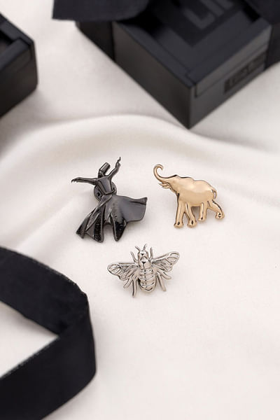 Gold and grey magician and fly brooch gift set