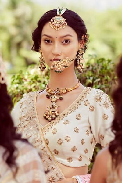 Gold and pink kundan embellished necklace set