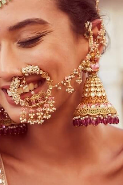 Gold and pink meenakari nose pin