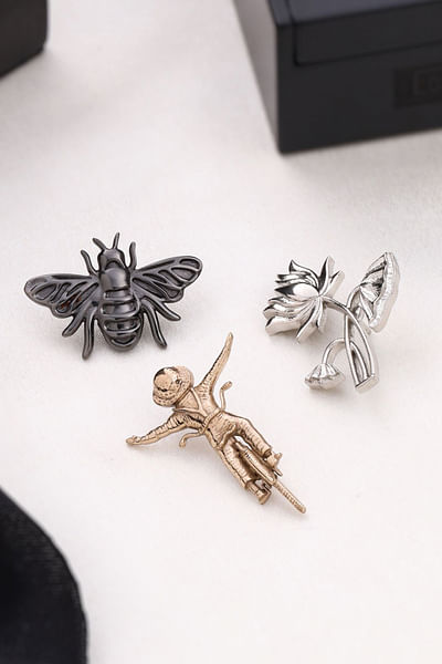 Gold and silver floral and fly brooch gift set