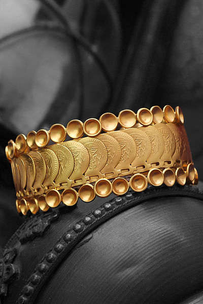 Gold coin bangle handcuff