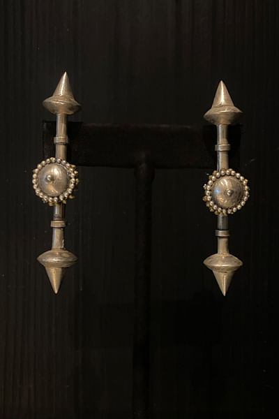 Gold cone and circular earrings