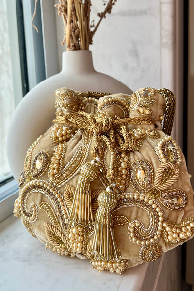 Gold embroidered potli bag