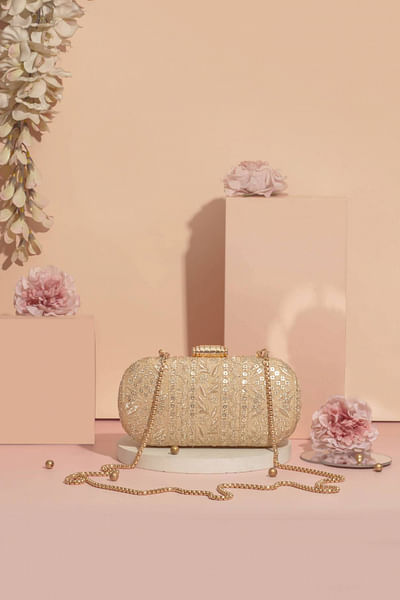 Gold embroidery capsule clutch