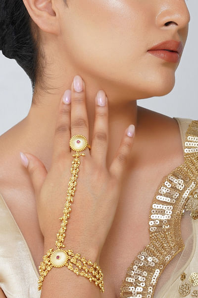 Gold floral motifs haathphool