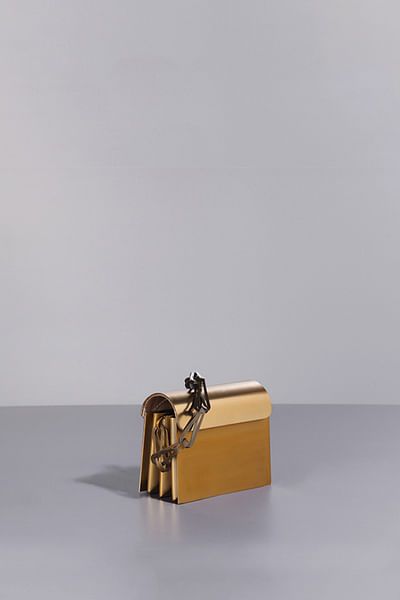 Gold leather mini sling bag