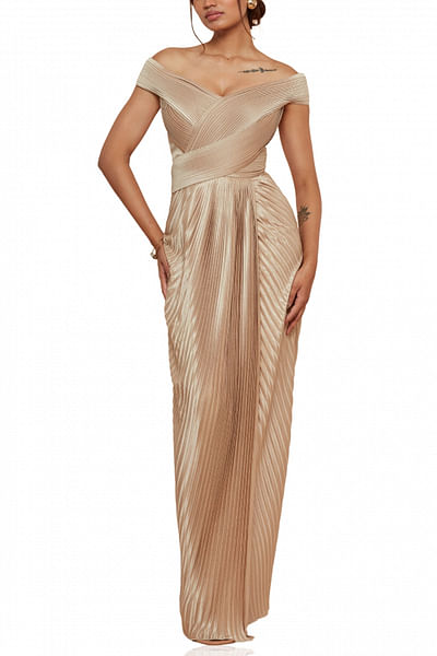 Gold pleated off-shoulder gown