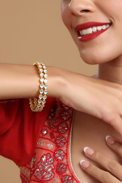 Gold teardrop kundan bangle
