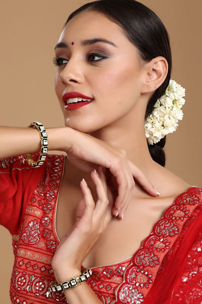 Green kundan and meenakari bangles
