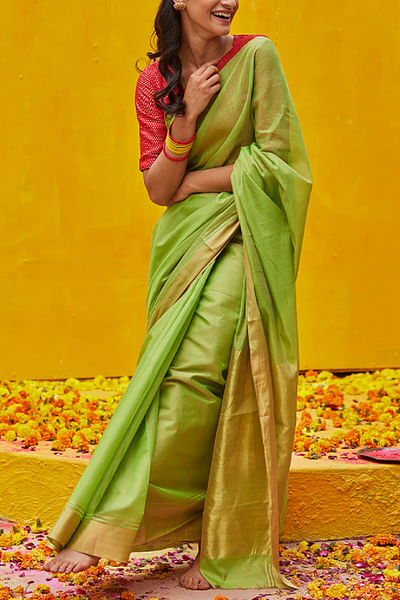 Green zari woven sari