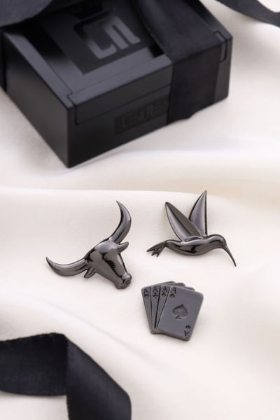Grey bull and bird brooch gift set