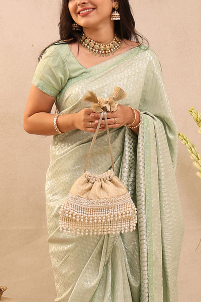 Ivory brocade potli bag