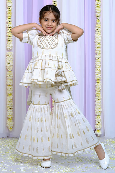 Ivory embroidered peplum sharara set