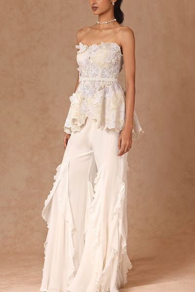Ivory floral embroidered peplum top