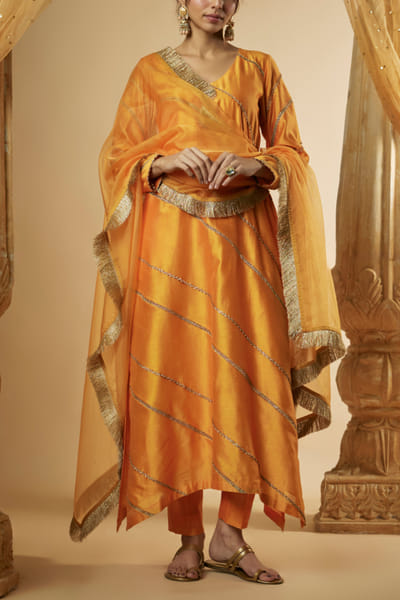 The Aarya Light orange panelled lace work kurta set ARYNOV24D213