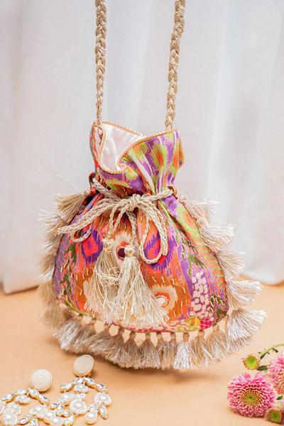 Multicolour ikat and artsy printed potli bag