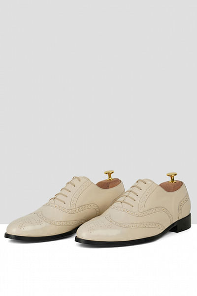 Nude lace-up brogues