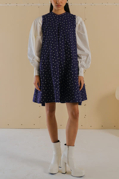 Off-white and blue polka smocked dress