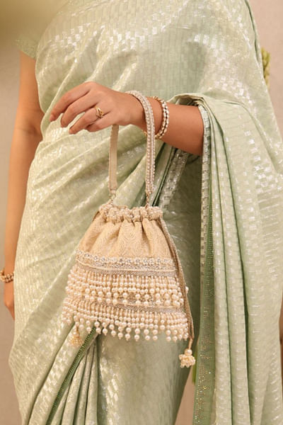Off-white brocade potli bag
