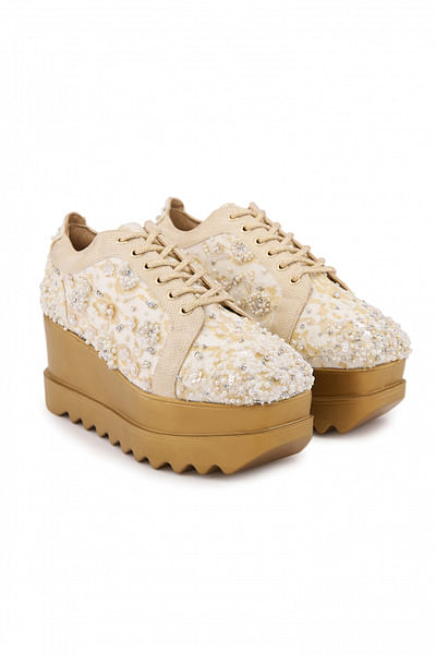 Off white pearl embellished wedge sneakers