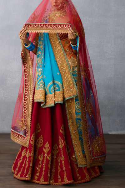 Orange and red embroidered lehenga set